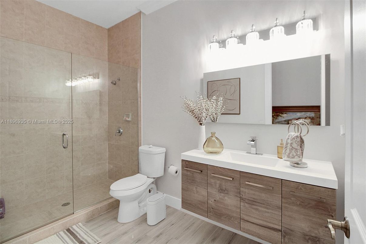 Bathroom, Dual Sink Vanities, Glass Shower, Interior, Wood Texture Flooring