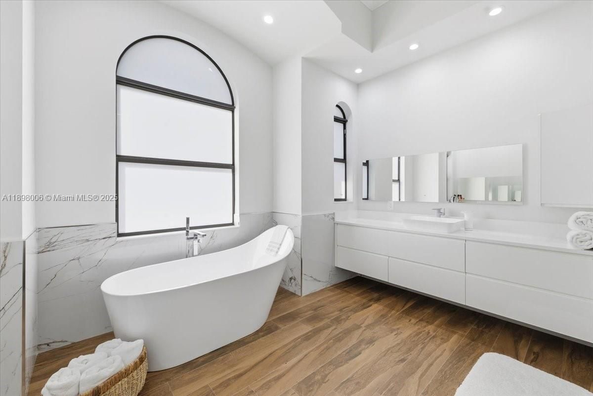 Bathroom, Dual Sink Vanities, Free Standing Baths, Interior, Recessed Lighting, Wood Texture Flooring