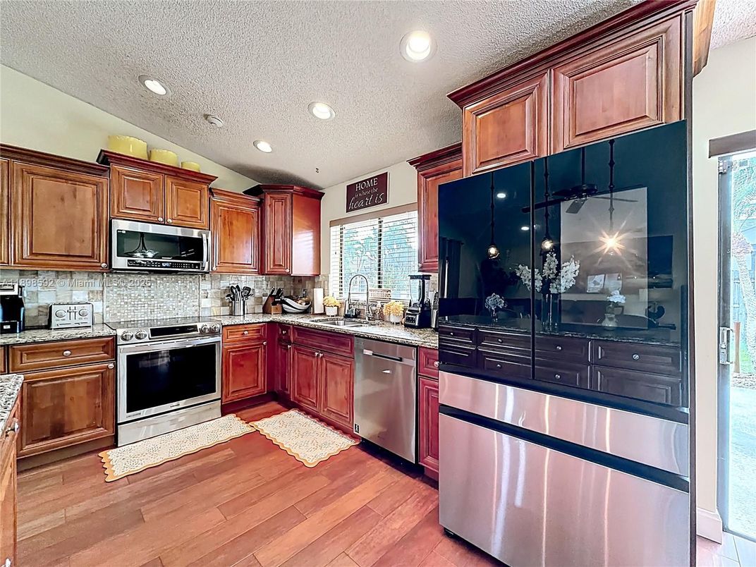 Interior, Kitchen, Recessed Lighting, Stainless Steel Appliances, Wood Texture Flooring