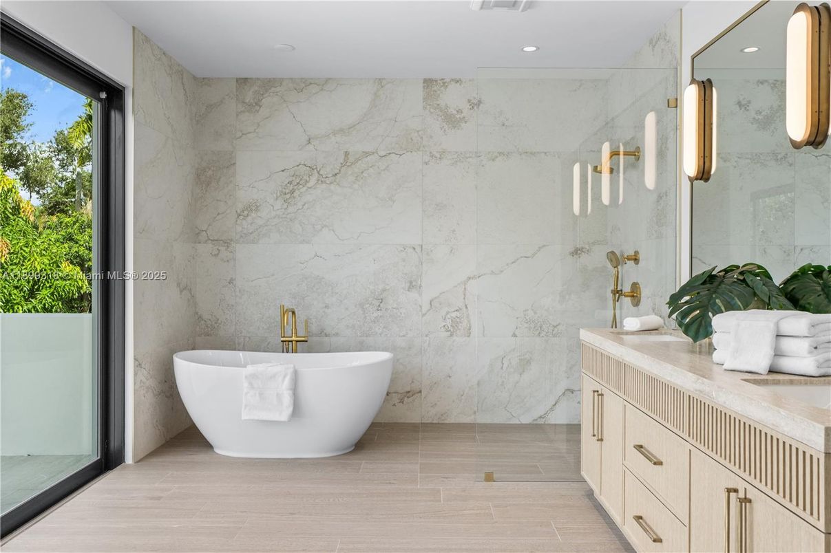 Bathroom, Free Standing Baths, Glass Shower, Interior, Marble Walls, Recessed Lighting