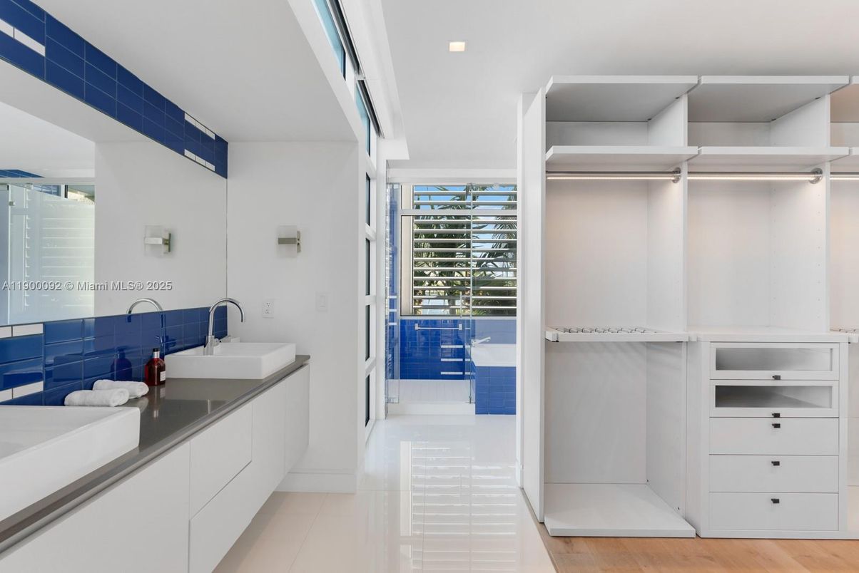Bathroom, Dual Sink Vanities, Interior, Recessed Lighting, Walk-in Closets, Wood Texture Flooring