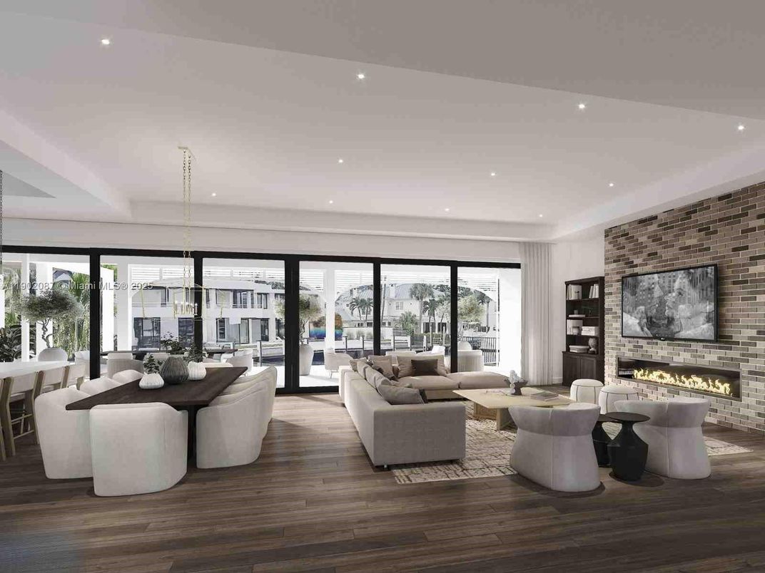 Dining room, Fireplace, Interior, Living room, Pendant Lights, Recessed Lighting, Stone Walls, Wood Texture Flooring