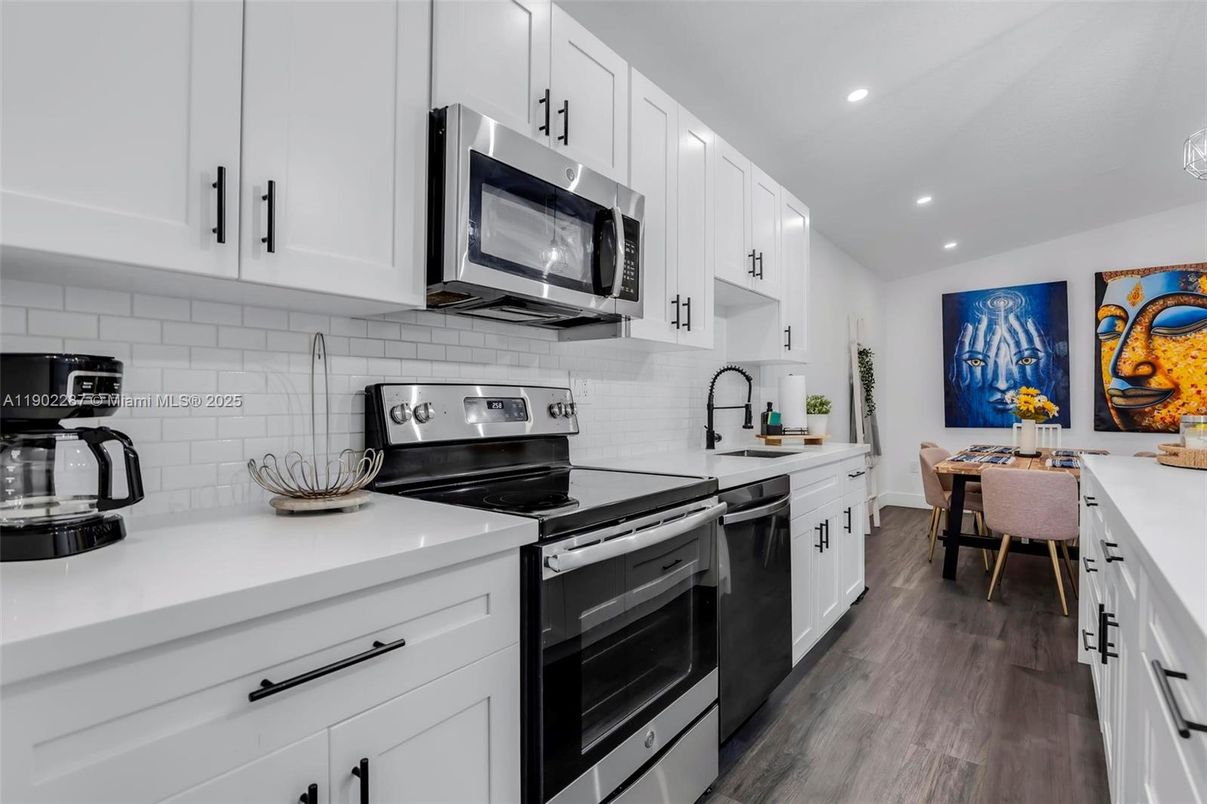 Dining room, Interior, Kitchen, Recessed Lighting, Stainless Steel Appliances, Wood Texture Flooring