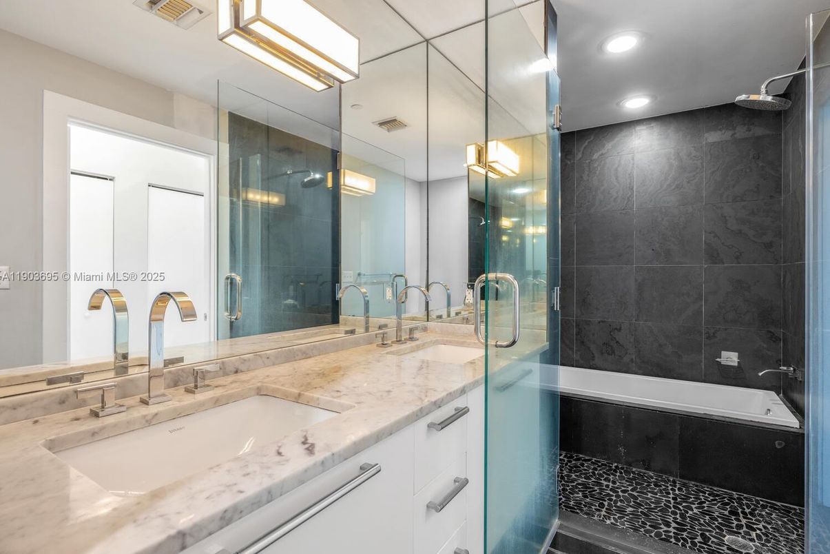 Bathroom, Dual Sink Vanities, Glass Shower, Interior, Marble Walls, Recessed Lighting