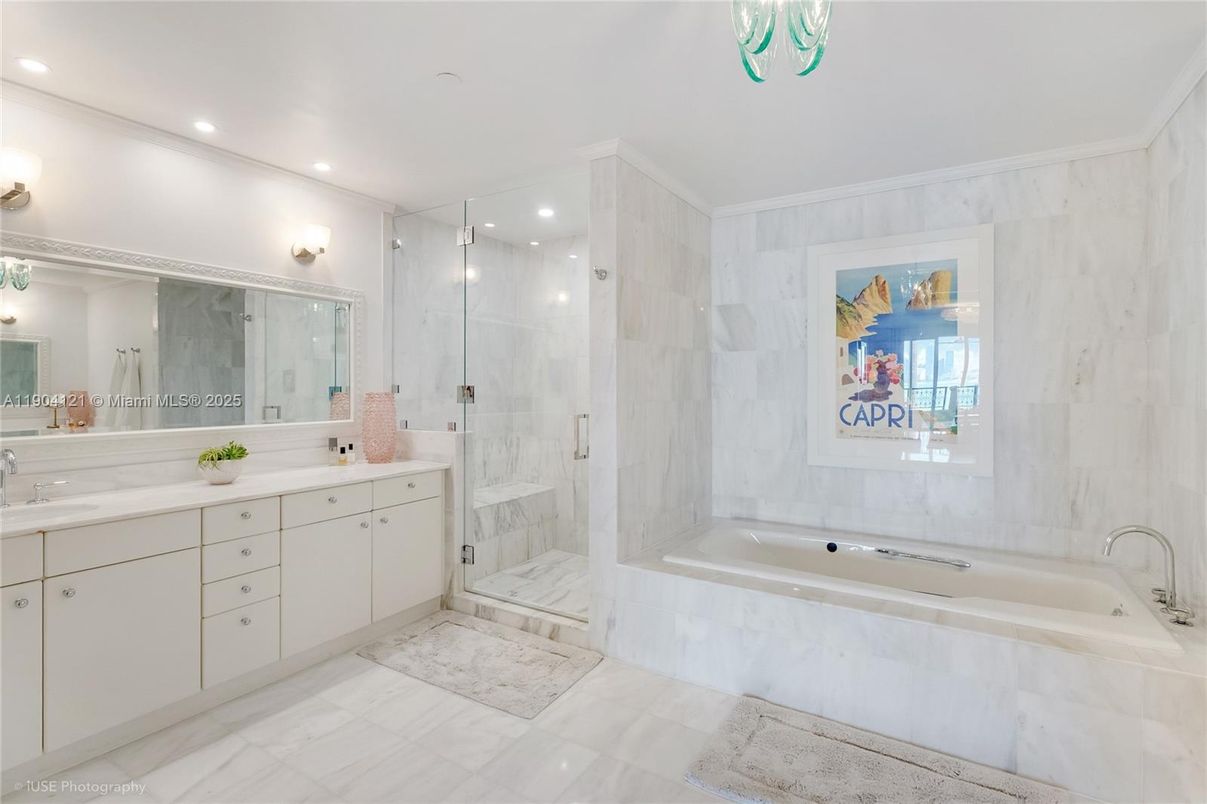 Bathroom, Dual Sink Vanities, Glass Shower, Interior, Marble, Marble Walls, Recessed Lighting