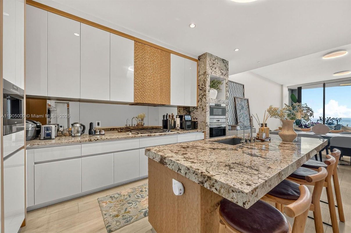 Dining room, Interior, Kitchen, Recessed Lighting, Stainless Steel Appliances, Water, Wood Texture Flooring