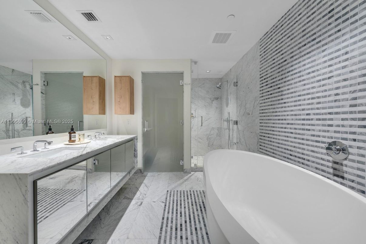 Bathroom, Dual Sink Vanities, Free Standing Baths, Glass Shower, Interior, Marble, Marble Walls, Recessed Lighting