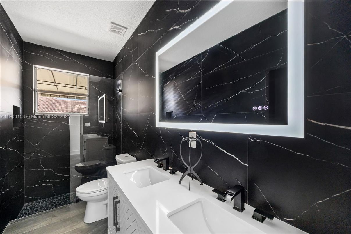 Bathroom, Dual Sink Vanities, Interior, Marble Walls, Wood Texture Flooring