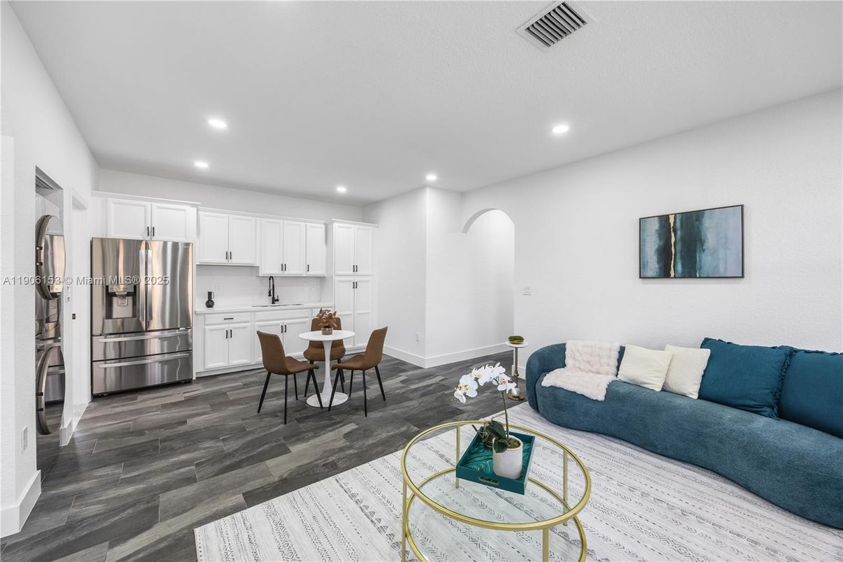 Dining room, Interior, Kitchen, Living room, Recessed Lighting, Stainless Steel Appliances, Wood Texture Flooring