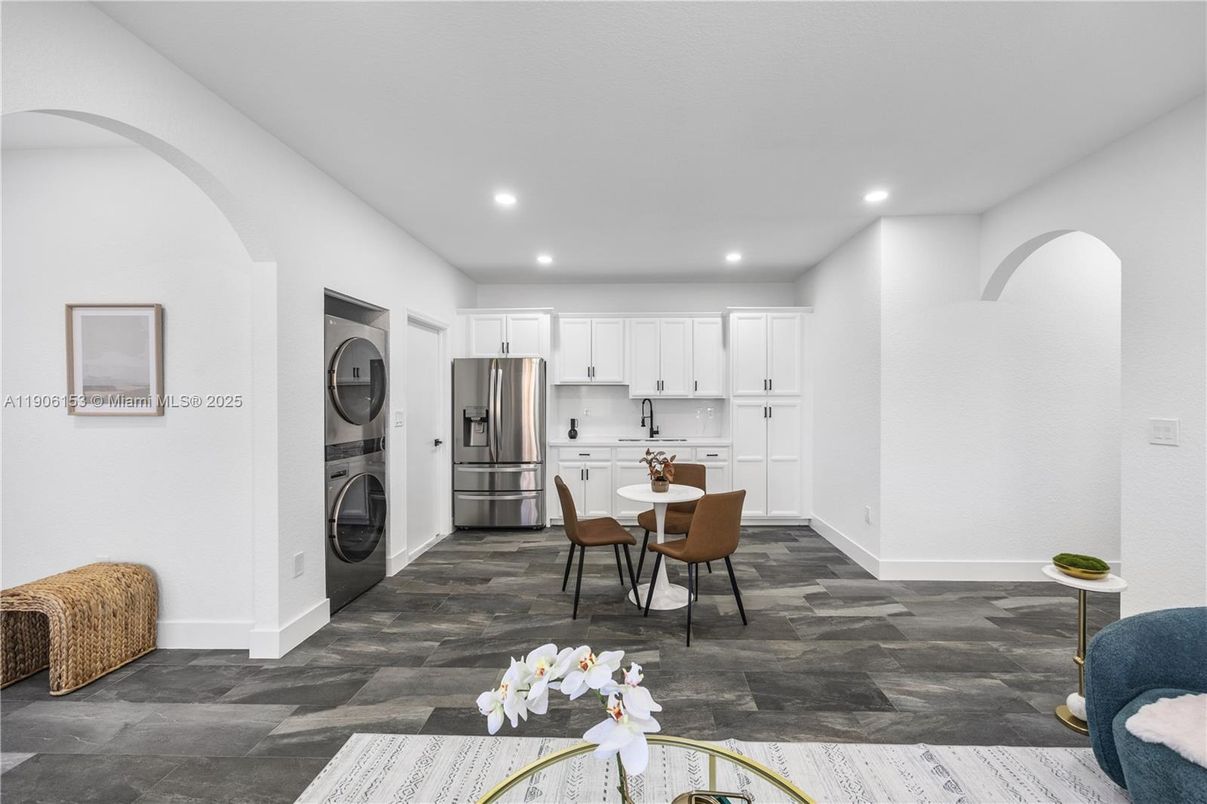 Dining room, Interior, Kitchen, Recessed Lighting, Stainless Steel Appliances, Washer, Wood Texture Flooring