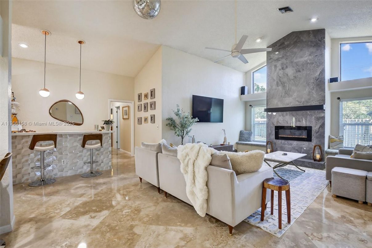 Fireplace, Interior, Living room, Marble Walls, Pendant Lights, Recessed Lighting