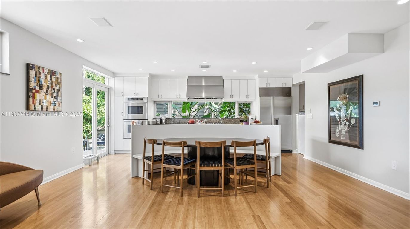Dining room, Interior, Kitchen, Recessed Lighting, Stainless Steel Appliances, Wood Texture Flooring