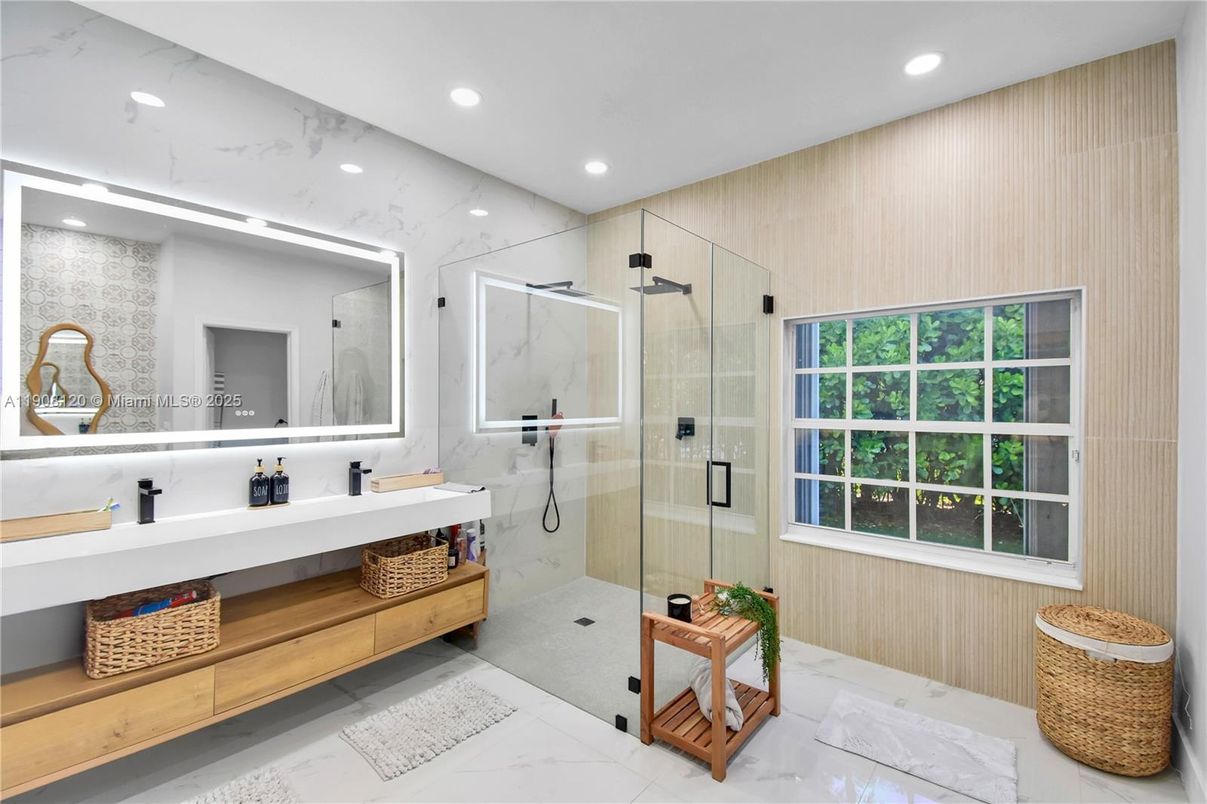 Bathroom, Dual Sink Vanities, Glass Shower, Interior, Marble, Marble Walls, Recessed Lighting