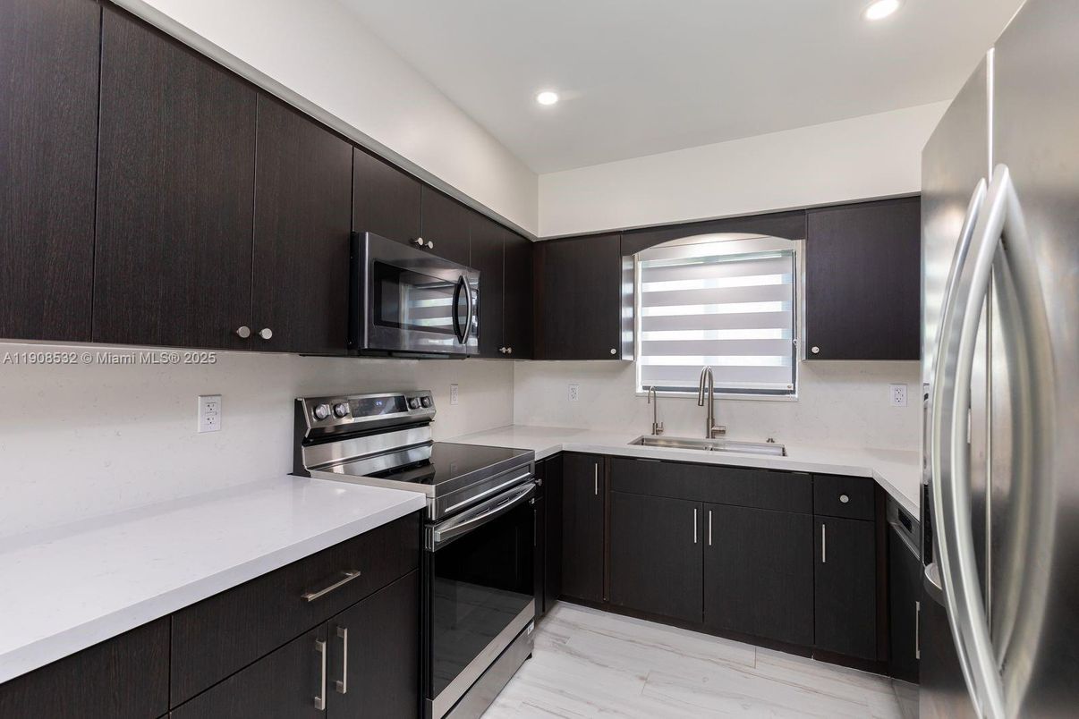 Interior, Kitchen, Recessed Lighting, Stainless Steel Appliances, Wood Texture Flooring