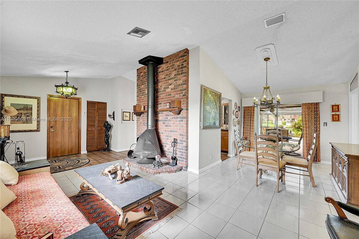 Dining room, Fireplace, Interior, Living room, Pendant Lights, Stone Walls
