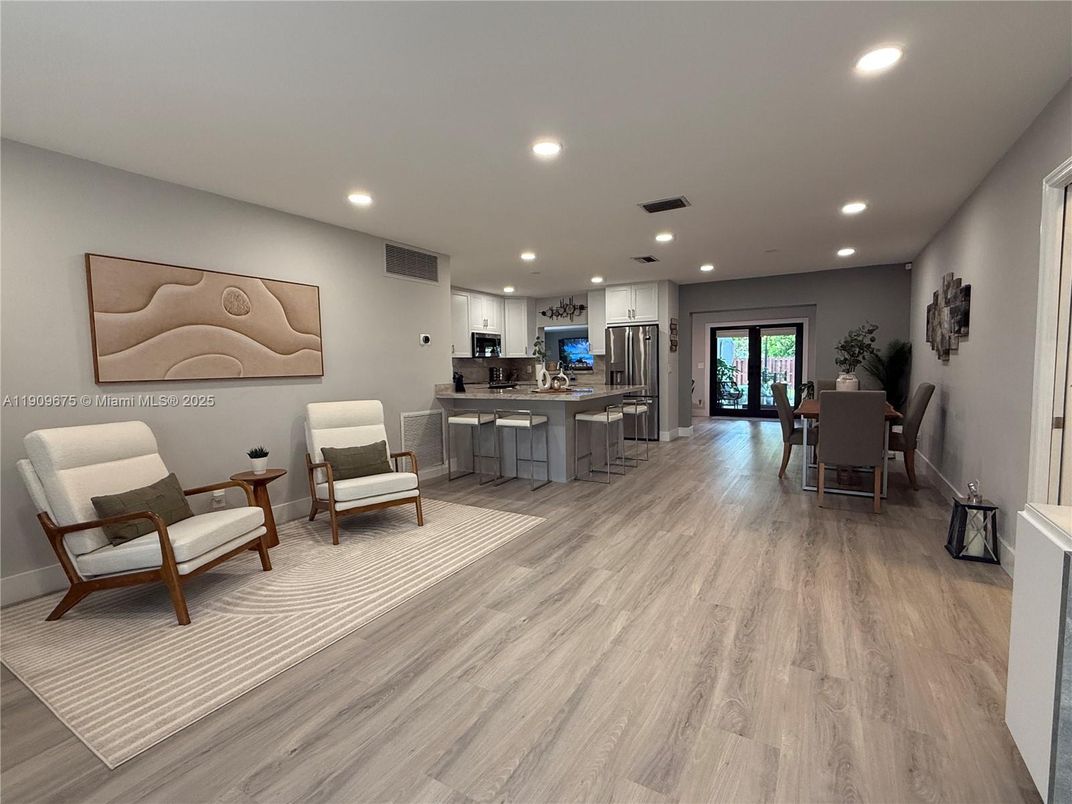 Dining room, Interior, Kitchen, Recessed Lighting, Stainless Steel Appliances, Wood Texture Flooring