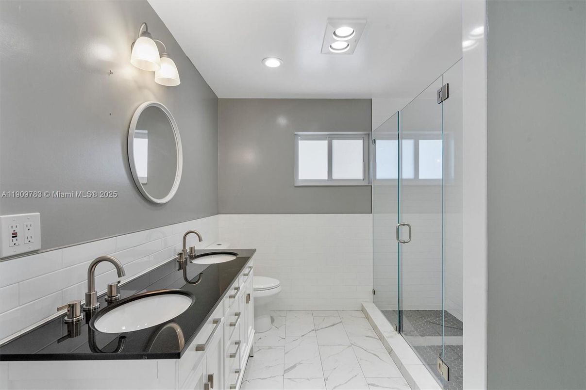 Bathroom, Dual Sink Vanities, Glass Shower, Interior, Marble, Recessed Lighting
