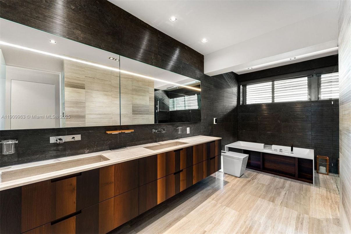 Bathroom, Dual Sink Vanities, Free Standing Baths, Glass Shower, Interior, Recessed Lighting, Wood Texture Flooring