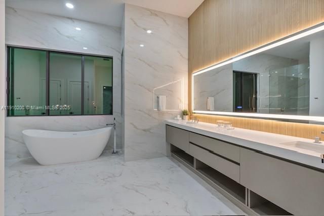 Bathroom, Dual Sink Vanities, Free Standing Baths, Interior, Marble, Marble Walls, Recessed Lighting