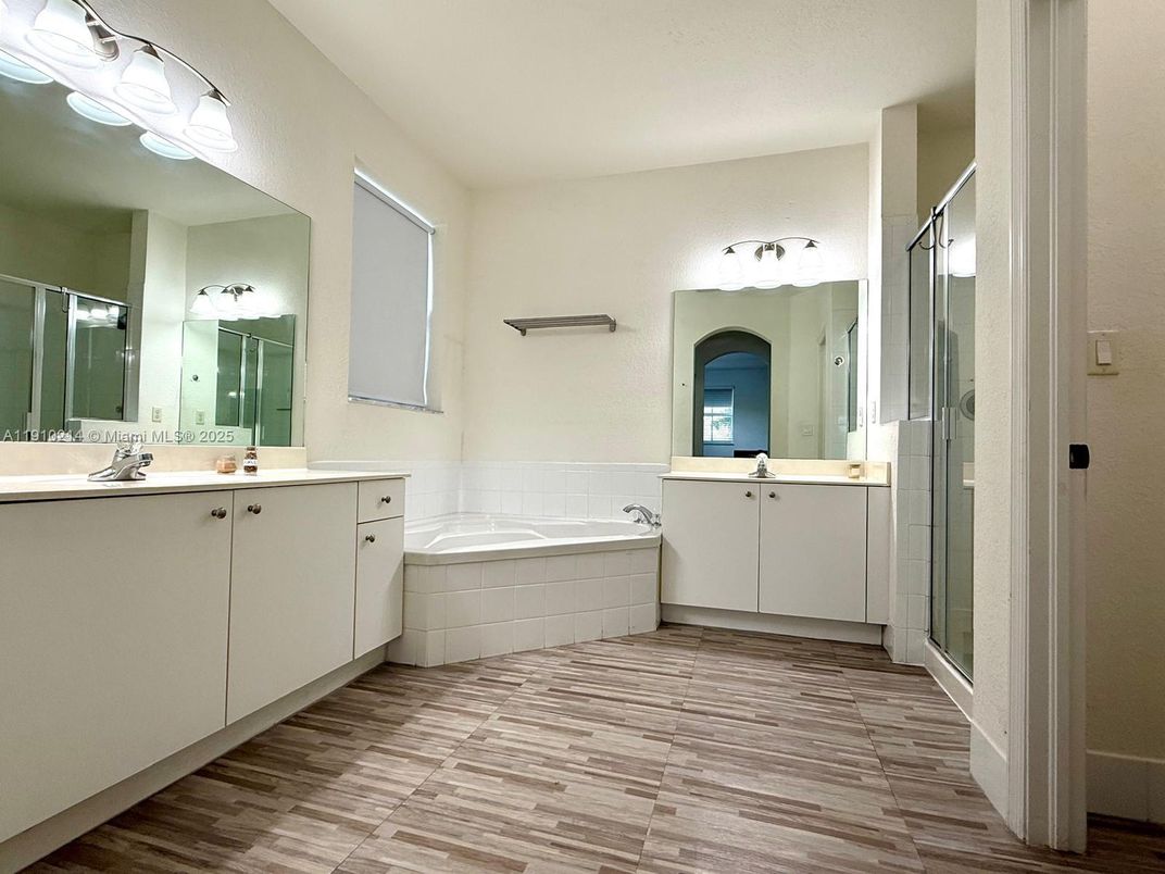 Bathroom, Dual Sink Vanities, Glass Shower, Interior, Wood Texture Flooring