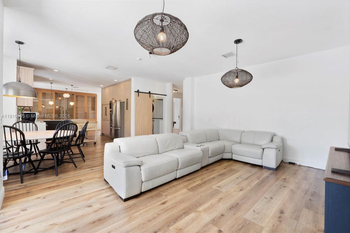 Dining room, Interior, Kitchen, Living room, Pendant Lights, Recessed Lighting, Stainless Steel Appliances, Wood Texture Flooring