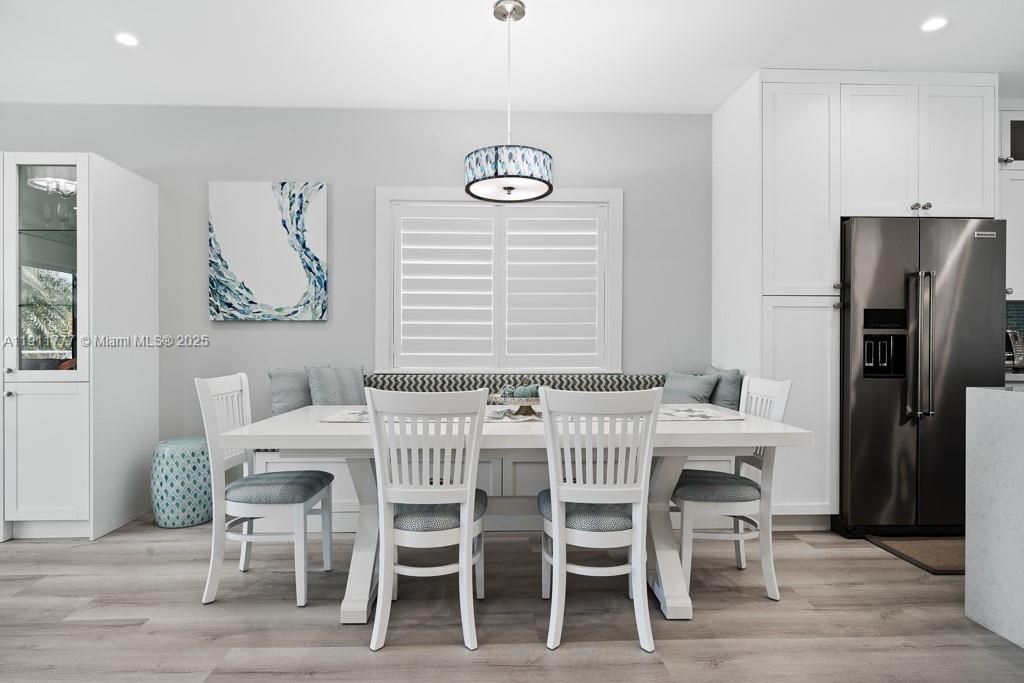 Dining room, Interior, Kitchen, Pendant Lights, Recessed Lighting, Stainless Steel Appliances, Wood Texture Flooring