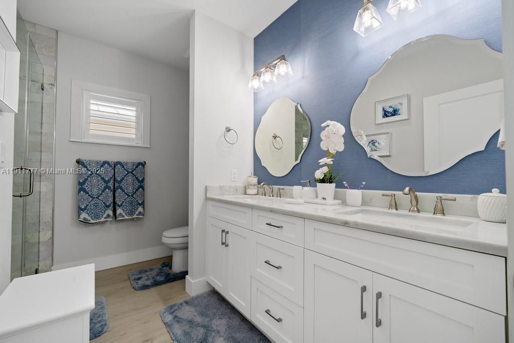 Bathroom, Dual Sink Vanities, Glass Shower, Interior, Wood Texture Flooring