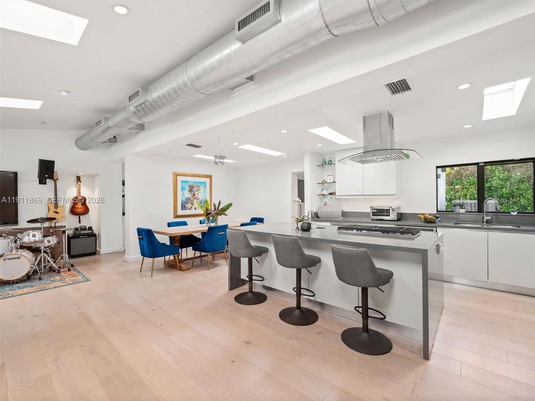 Dining room, Interior, Kitchen, Recessed Lighting, Stainless Steel Appliances, Wood Texture Flooring