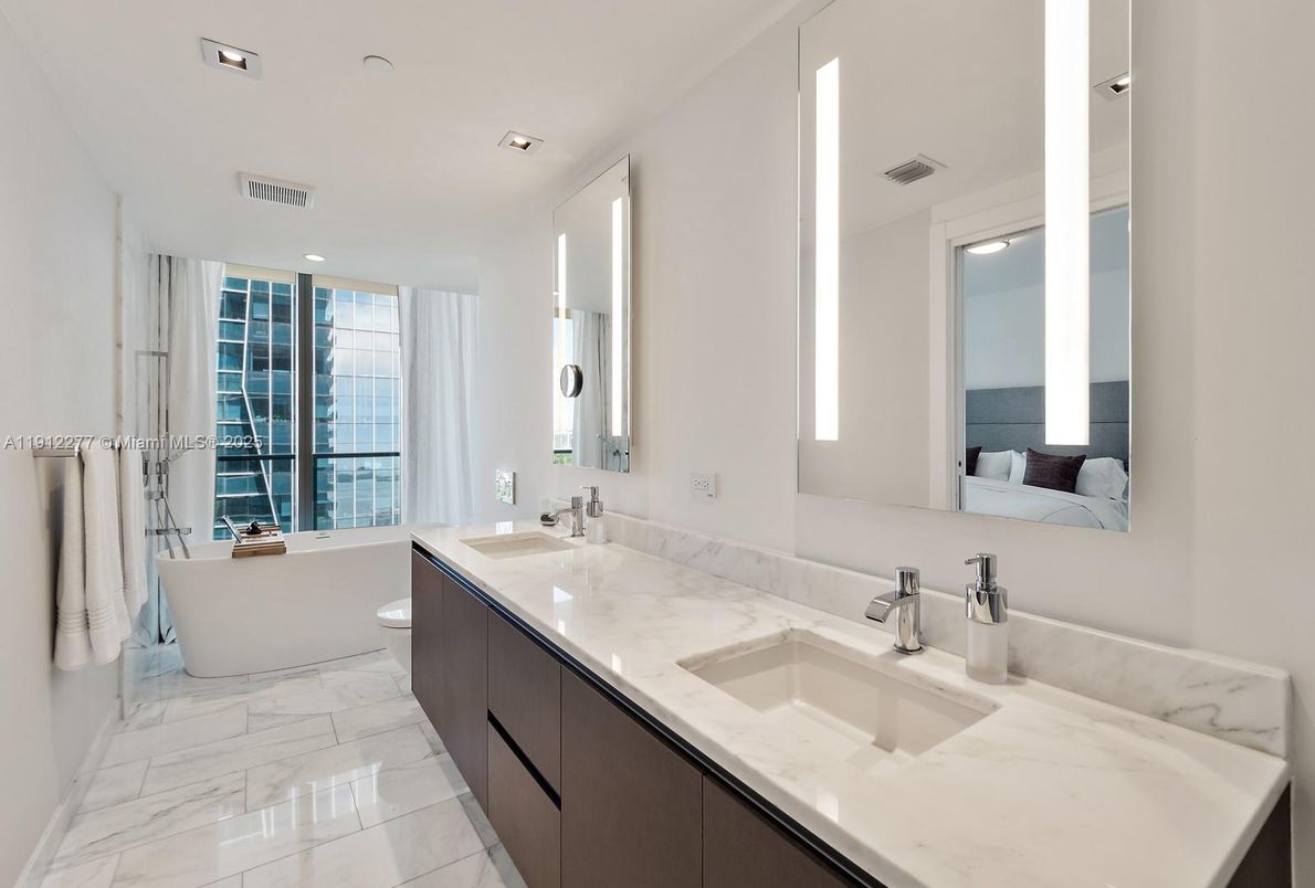 Bathroom, Dual Sink Vanities, Free Standing Baths, Interior, Marble, Recessed Lighting, Water
