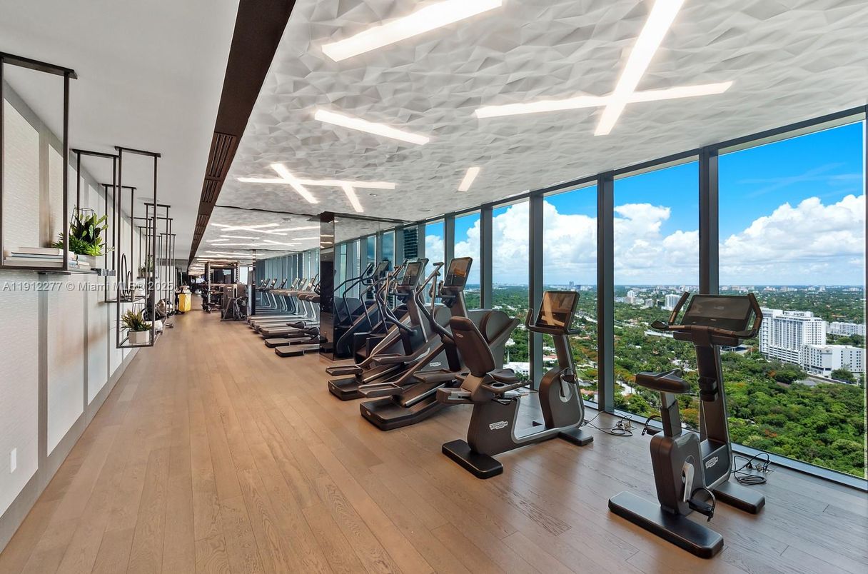 Fitness Equipment, Gym, Interior, Recessed Lighting, Water, Wood Texture Flooring