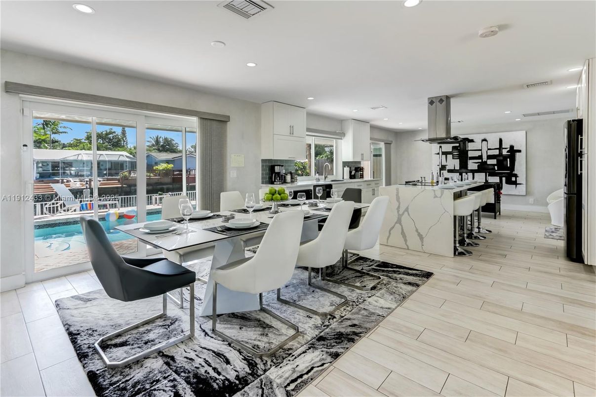 Dining room, Interior, Kitchen, Recessed Lighting, Stainless Steel Appliances, Wood Texture Flooring