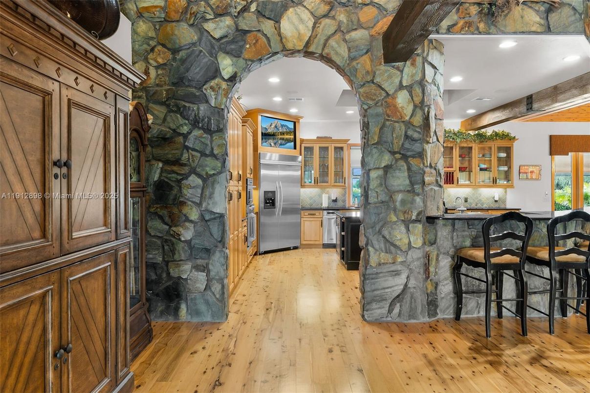 Interior, Kitchen, Recessed Lighting, Stainless Steel Appliances, Stone Walls, Wood Texture Flooring