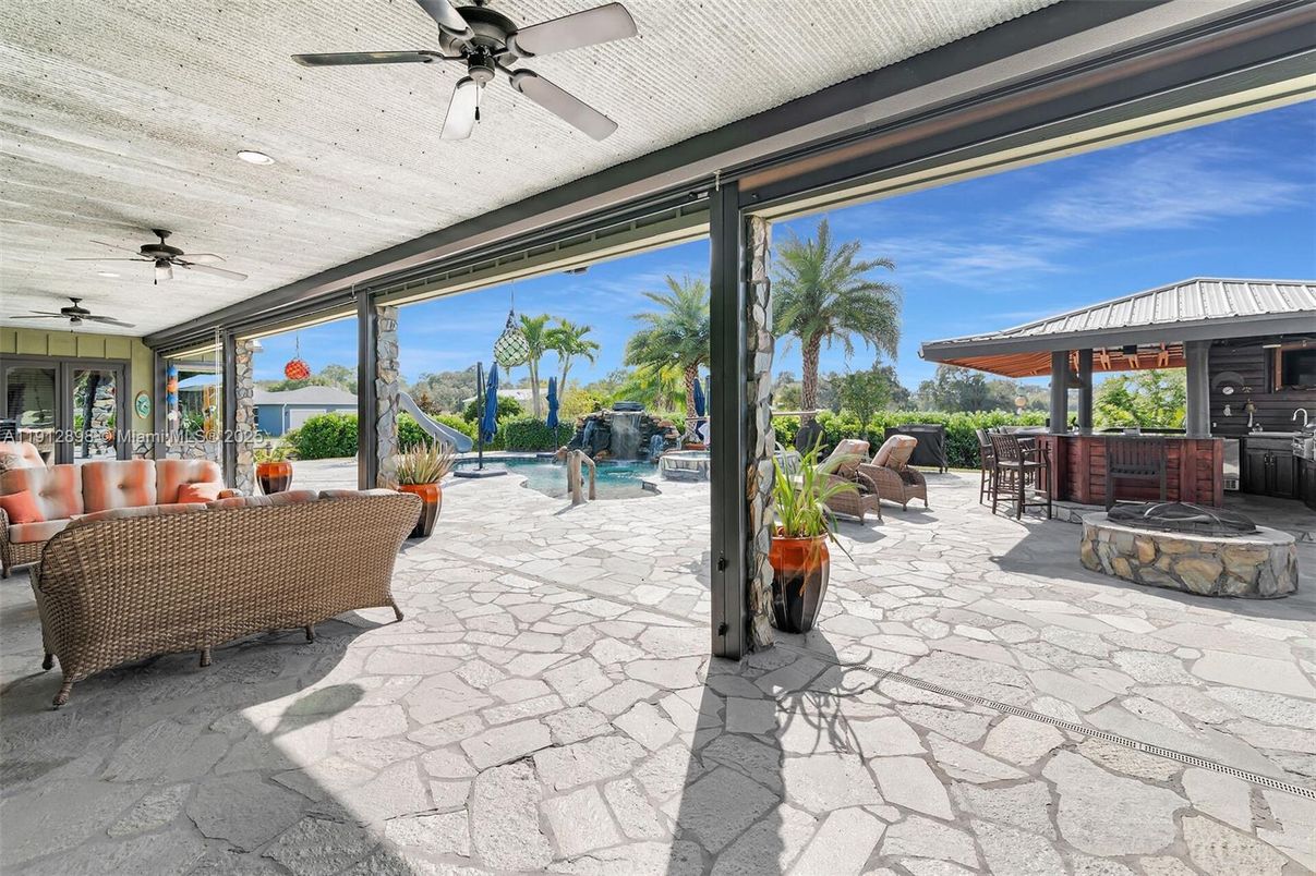 Exterior, Outdoor Kitchen, Pool, Sun Room
