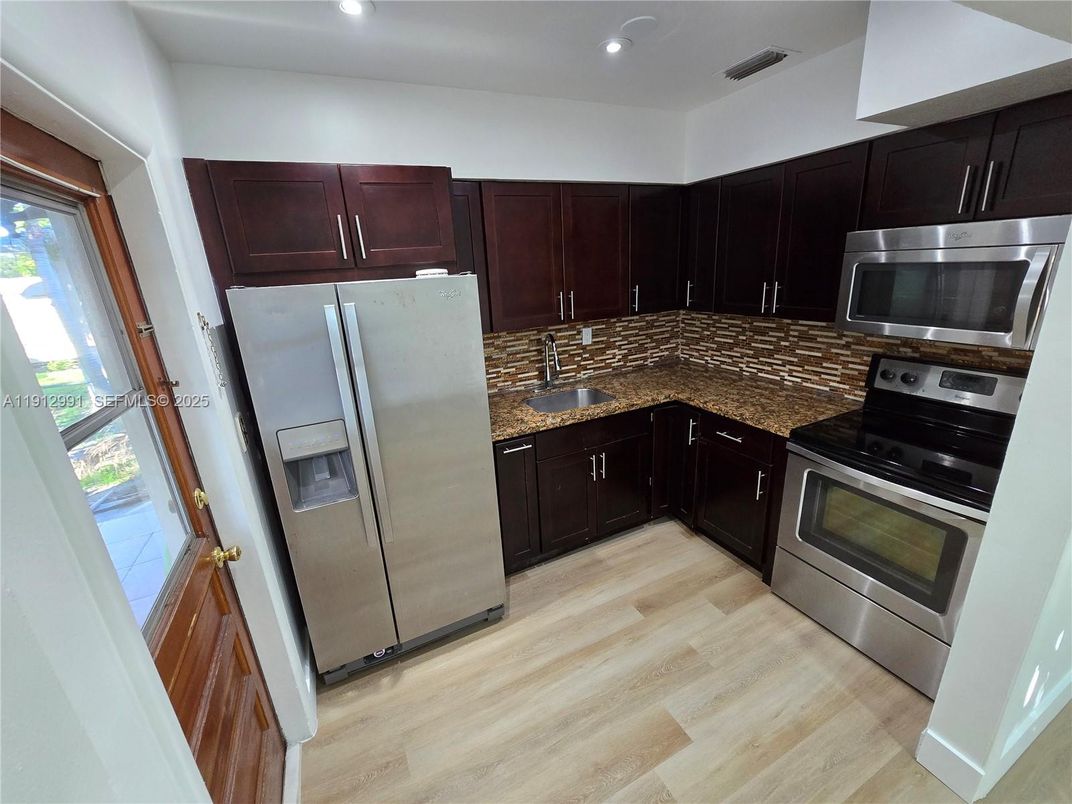 Interior, Kitchen, Recessed Lighting, Stainless Steel Appliances, Wood Texture Flooring