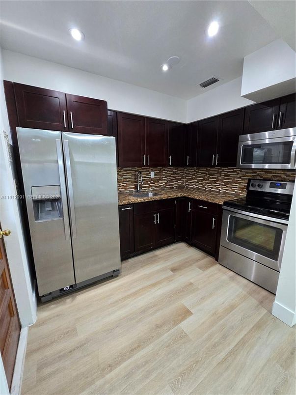 Interior, Kitchen, Recessed Lighting, Stainless Steel Appliances, Wood Texture Flooring