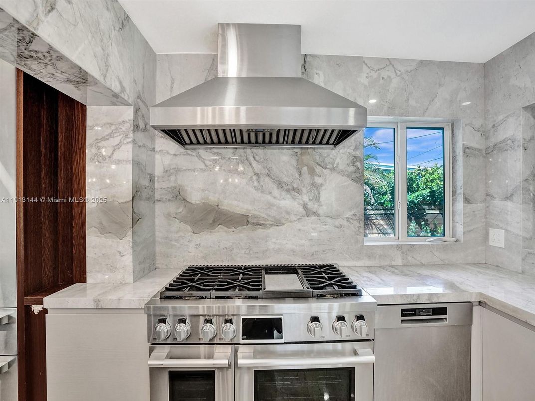Interior, Kitchen, Marble Walls, Stainless Steel Appliances