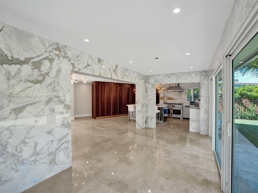 Interior, Kitchen, Marble Walls, Recessed Lighting, Stainless Steel Appliances