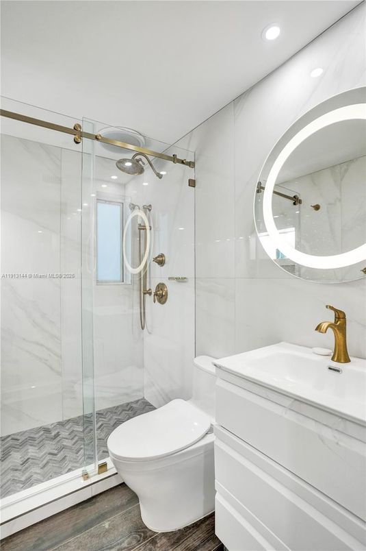 Bathroom, Glass Shower, Interior, Marble Walls, Recessed Lighting, Wood Texture Flooring