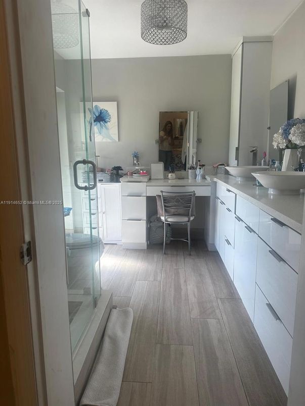 Bathroom, Dual Sink Vanities, Glass Shower, Interior, Wood Texture Flooring