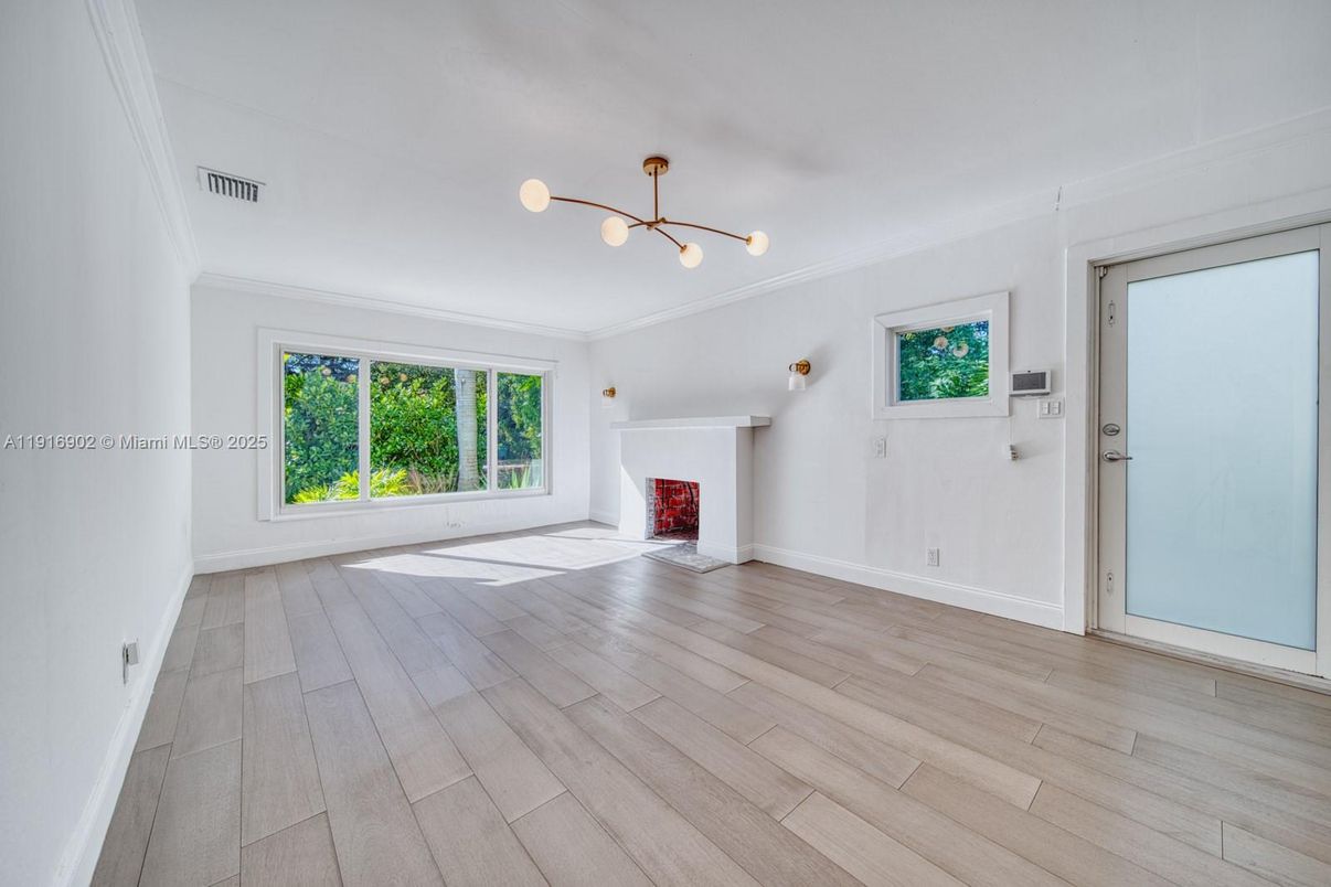 Empty room, Fireplace, Interior, Pendant Lights, Wood Texture Flooring