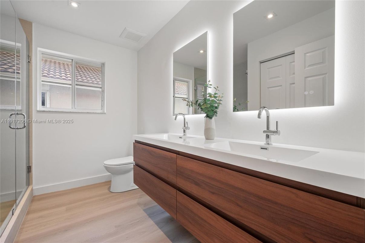 Bathroom, Dual Sink Vanities, Interior, Recessed Lighting, Wood Texture Flooring