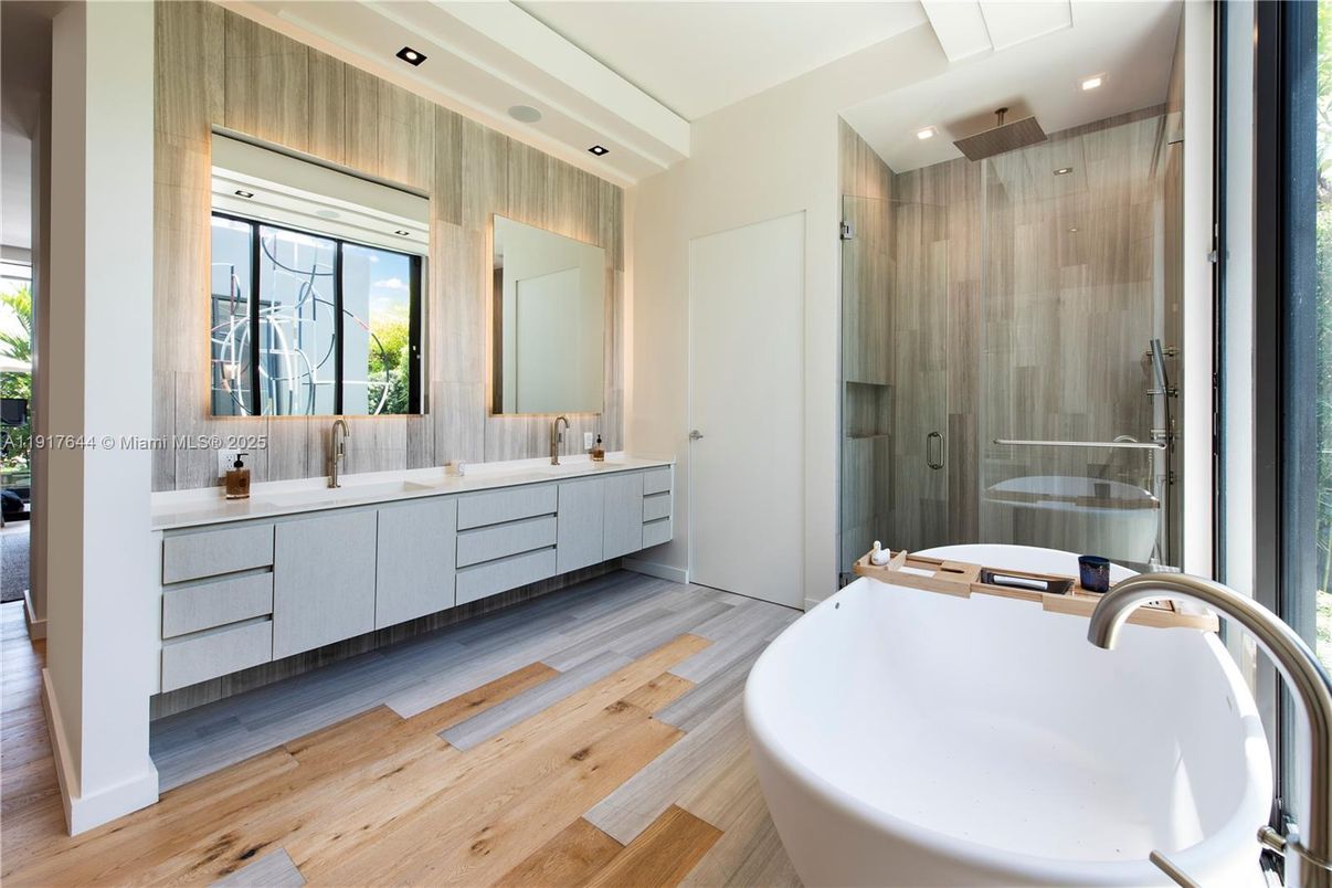 Bathroom, Dual Sink Vanities, Free Standing Baths, Glass Shower, Interior, Recessed Lighting, Wood Texture Flooring