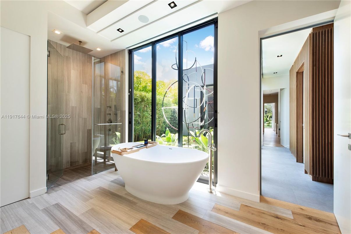 Bathroom, Free Standing Baths, Glass Shower, Interior, Recessed Lighting, Wood Texture Flooring