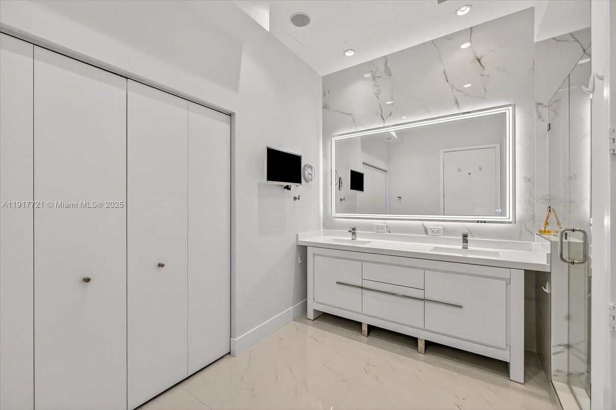 Bathroom, Dual Sink Vanities, Interior, Marble, Marble Walls, Recessed Lighting