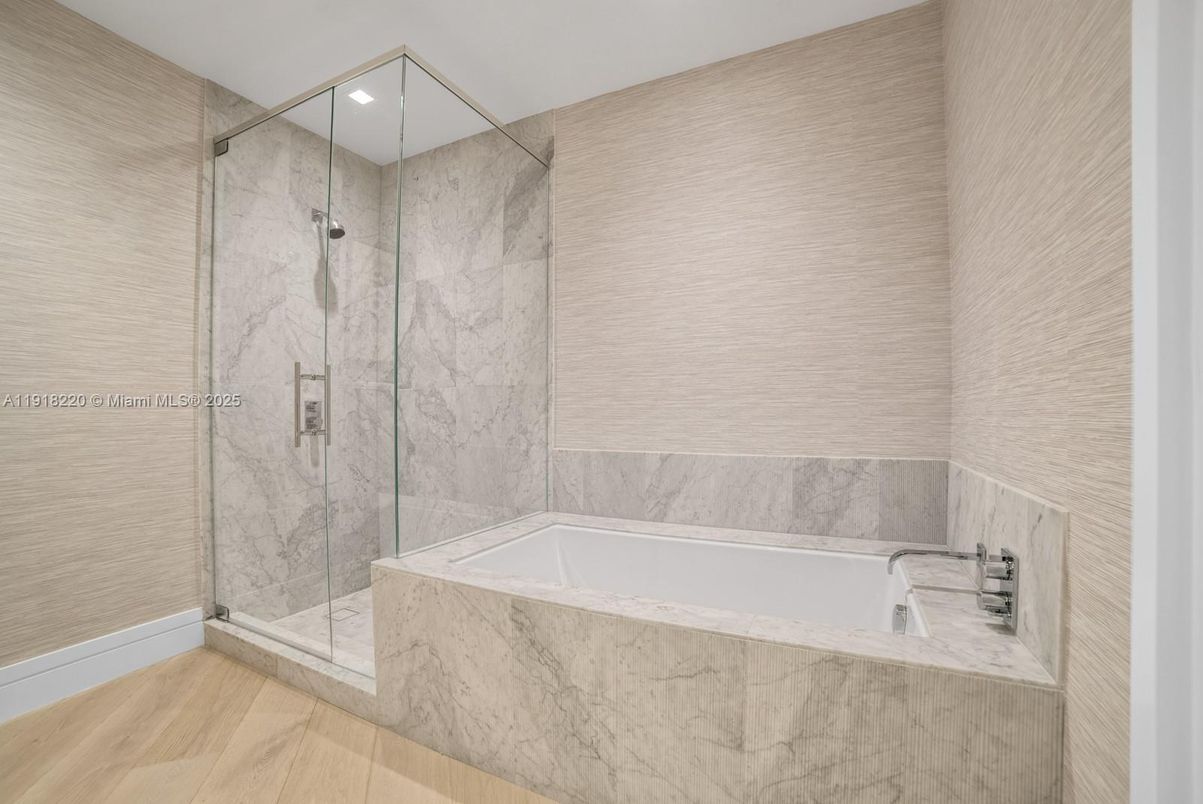 Bathroom, Glass Shower, Interior, Marble Walls, Recessed Lighting, Wood Texture Flooring