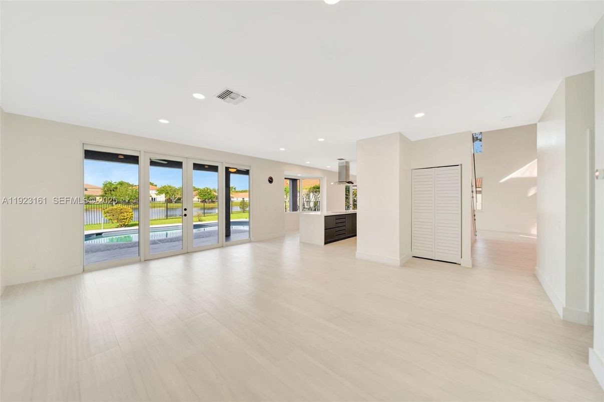 Empty room, Interior, Kitchen, Recessed Lighting, Water, Wood Texture Flooring