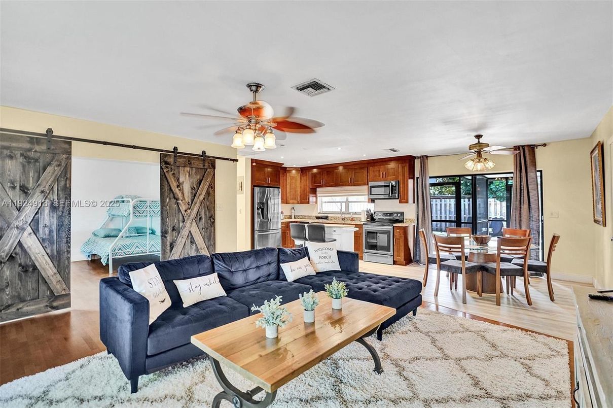 Dining room, Interior, Kitchen, Living room, Stainless Steel Appliances, Wood Texture Flooring
