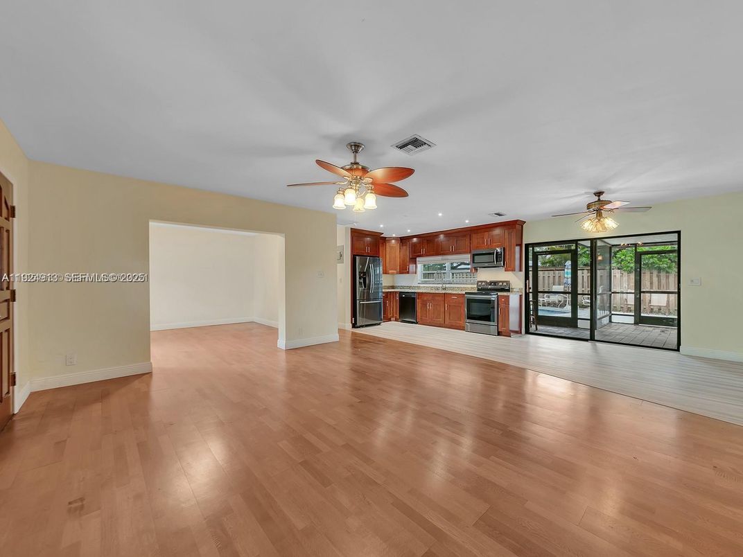 Empty room, Interior, Kitchen, Stainless Steel Appliances, Wood Texture Flooring