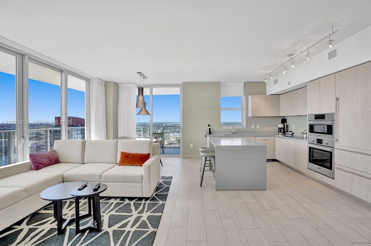 Dining room, Interior, Kitchen, Living room, Stainless Steel Appliances, Water, Wood Texture Flooring