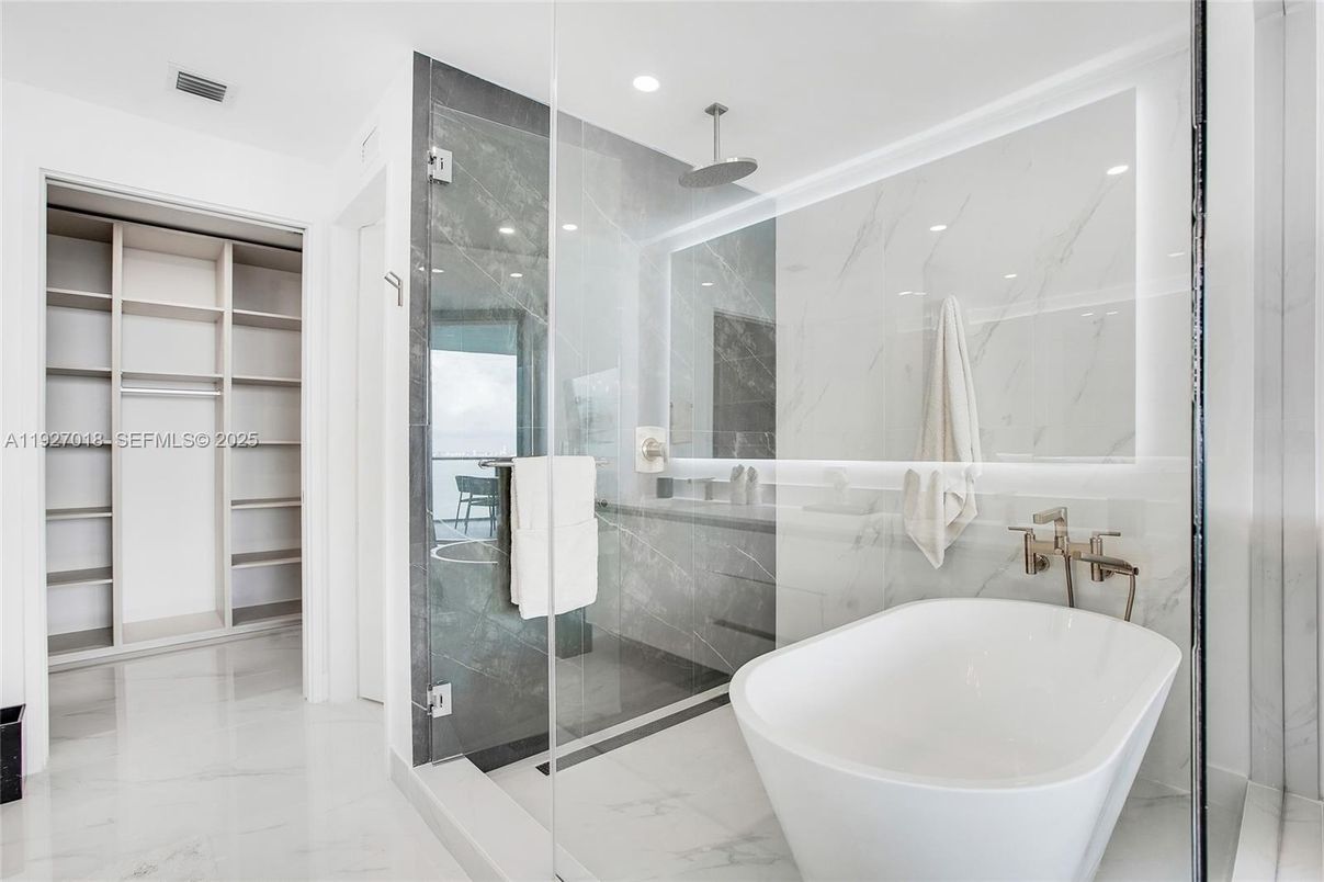 Bathroom, Free Standing Baths, Glass Shower, Interior, Marble, Marble Walls, Recessed Lighting